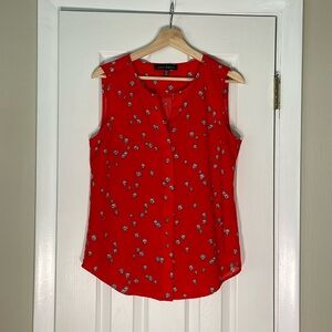 Umbrella print sleeveless button down with hidden buttons